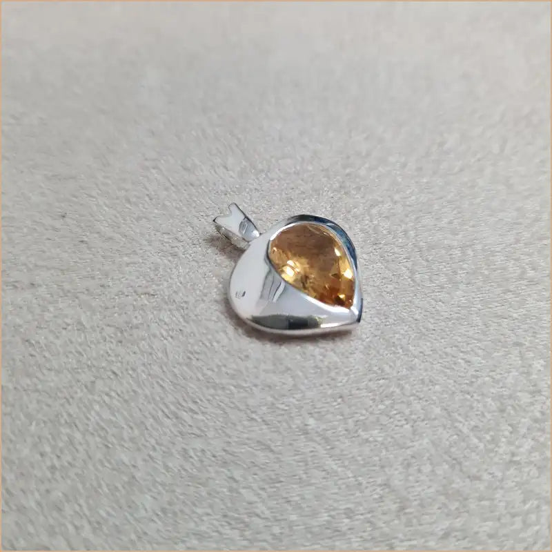 Pendentif citrine demi-coeur "PI1066.C"
