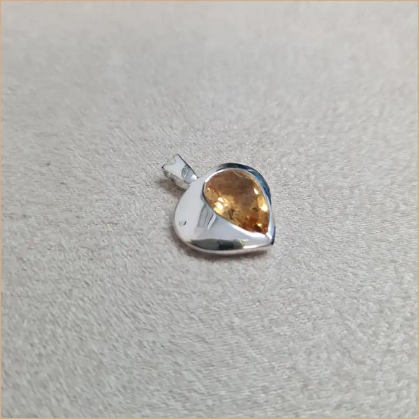 Pendentif citrine demi-coeur "PI1066.C"