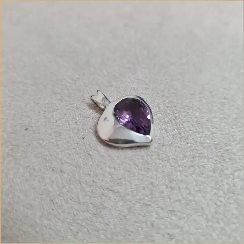 Pendentif améthyste demi-coeur "PI1066.A"