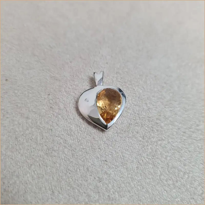 Pendentif citrine demi-coeur "PI1066.C"