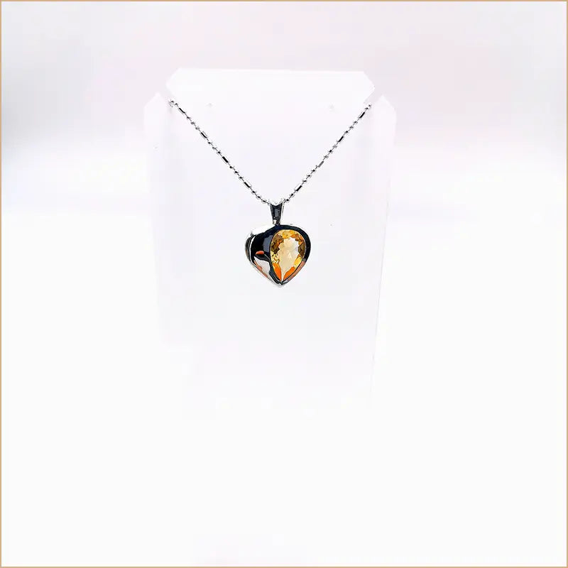 Pendentif citrine demi-coeur "PI1066.C"
