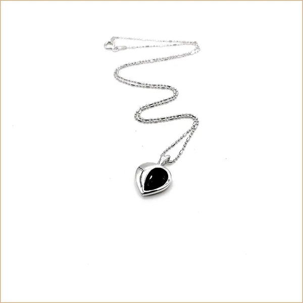 Pendentif onyx demi-coeur "PI1066.O"