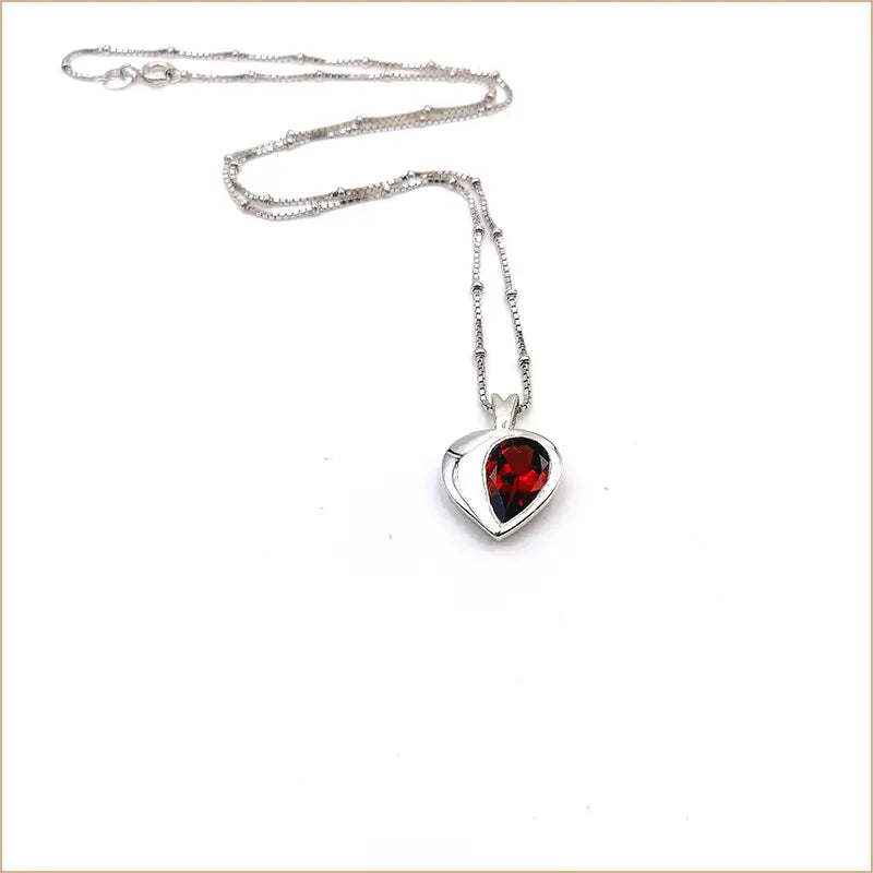 Pendentif grenat demi-coeur "PI1067.G"