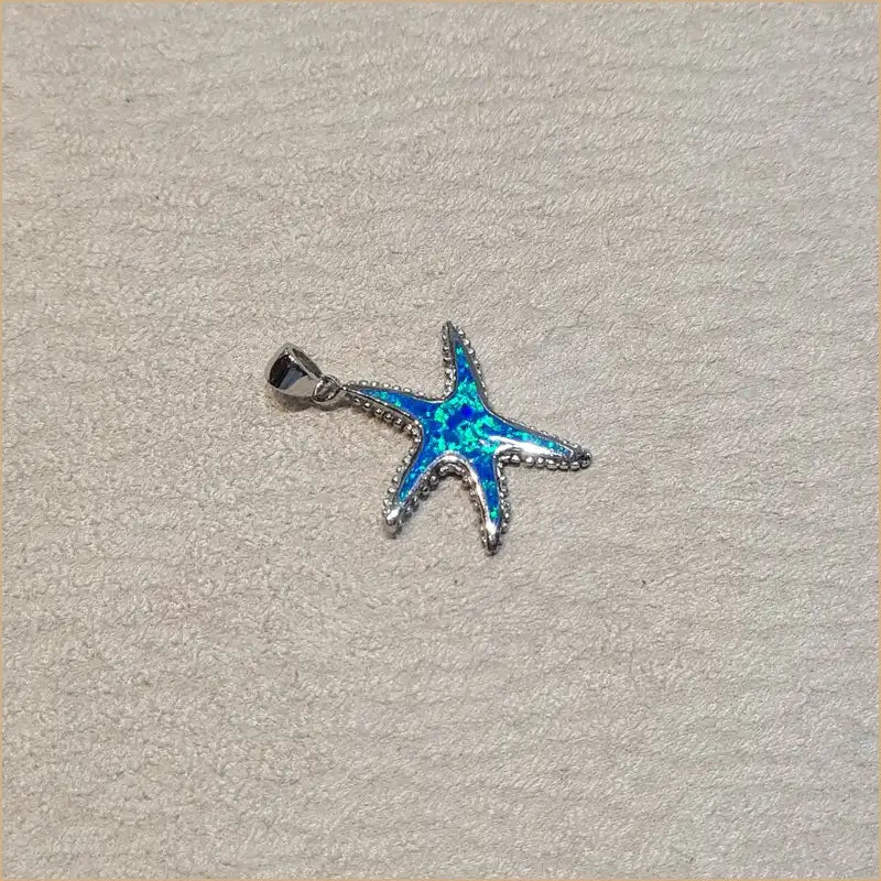 Pendentif étoile de mer opaline bleue "PO181.B"
