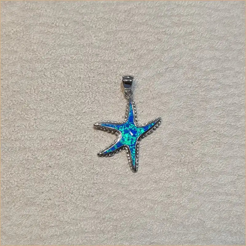 Pendentif étoile de mer opaline bleue "PO181.B"