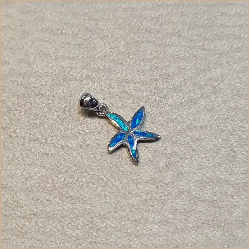Pendentif étoile de mer opaline bleue "PO184.B"