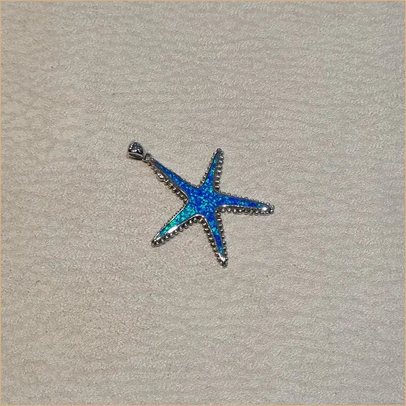 Pendentif étoile de mer opaline bleue "PO186.B"