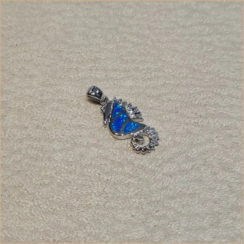 Pendentif hyppocampe opaline bleue "PO192.B"