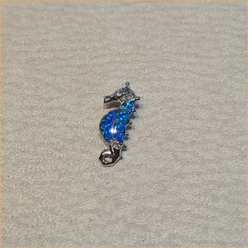 Pendentif hyppocampe opaline bleue "PO193.B"