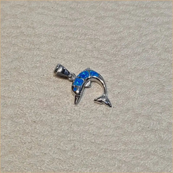 Pendentif dauphin opaline bleue "PO200.B"