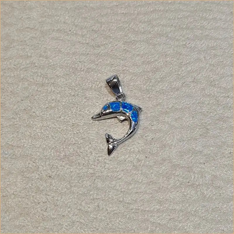 Pendentif dauphin opaline bleue "PO200.B"