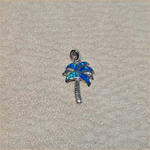 Pendentif palmier opaline bleue "PO209.B"