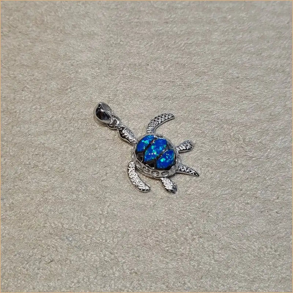 Pendentif tortue opaline bleue "POT24.B"