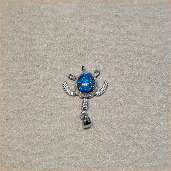 Pendentif tortue opaline bleue "POT24.B"