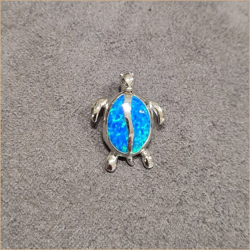 Pendentif tortue opaline bleu "POT28.B"