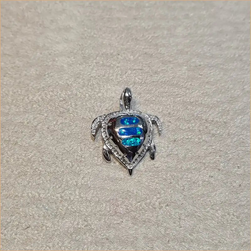 Pendentif tortue opaline bleue "POT32.B"