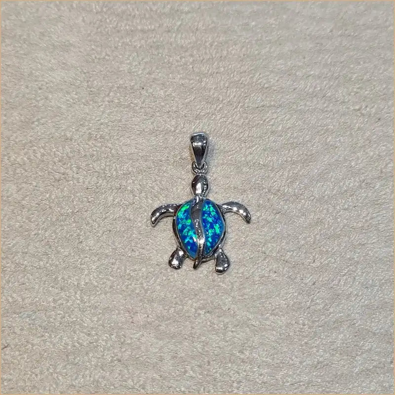 Pendentif tortue opaline bleue "POT36.B"