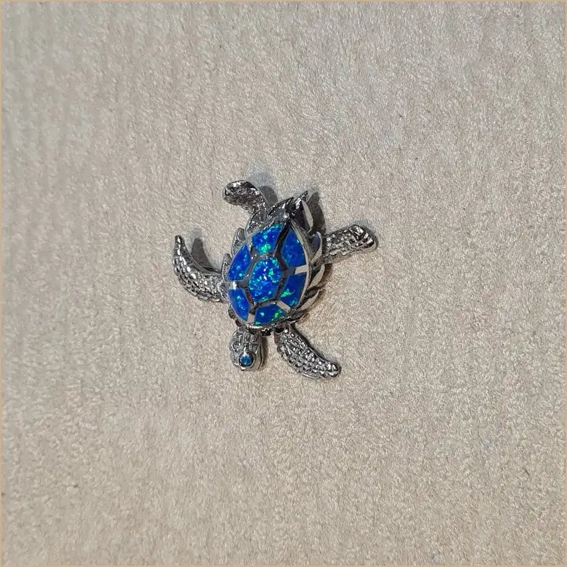 Pendentif tortue opaline bleue "POT37.B"