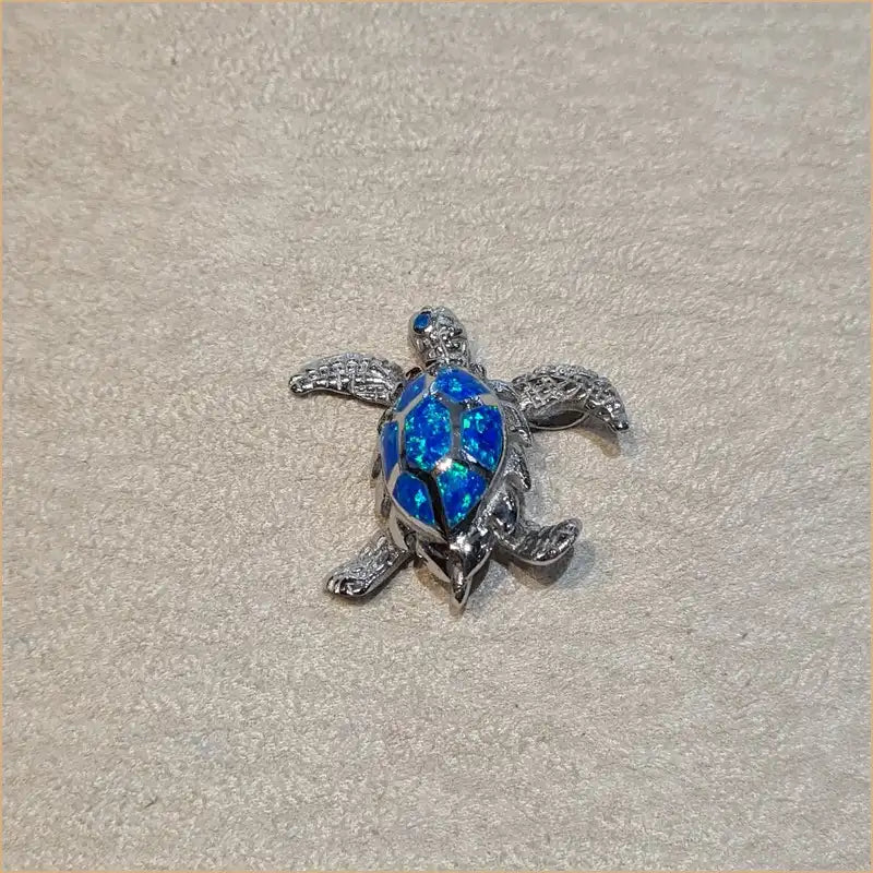 Pendentif tortue opaline bleue "POT37.B"