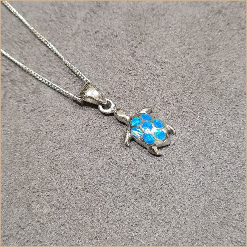 Pendentif tortue opaline bleu "POT39.B"