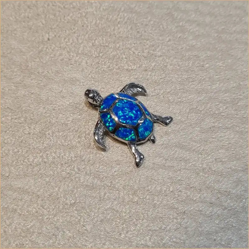Pendentif tortue en argent 925 et opaline bleue de taille moyenne POT40