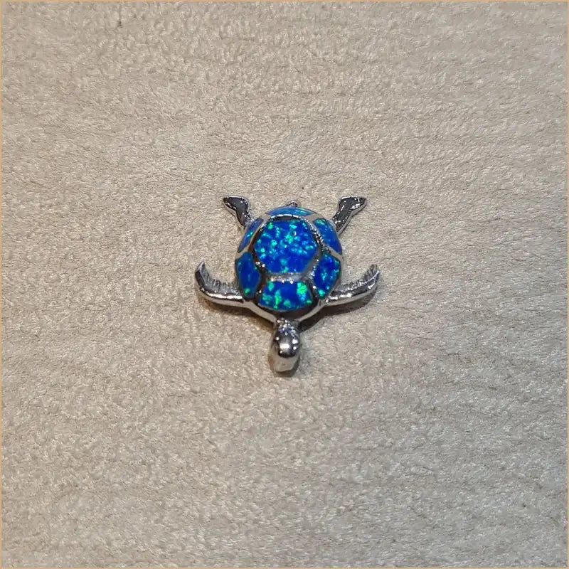 Pendentif tortue en argent 925 et opaline bleue POT40
