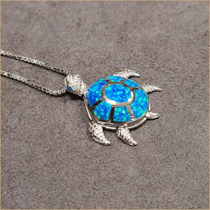Pendentif tortue opaline bleu "POT41.B"
