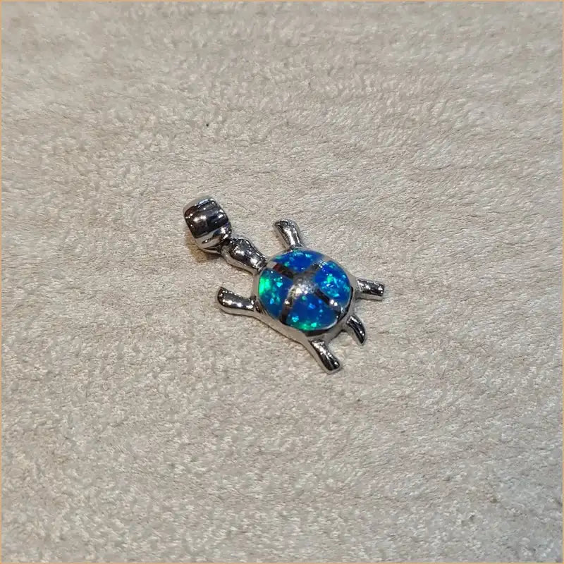 Pendentif tortue opaline bleue "POT42.B"