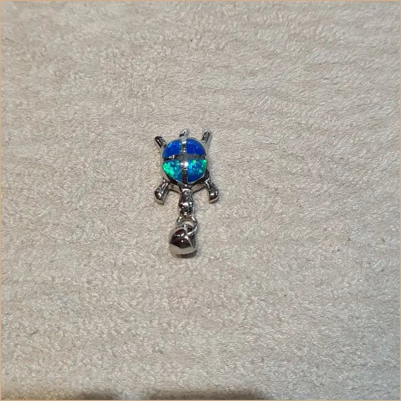 Pendentif tortue opaline bleue "POT42.B"