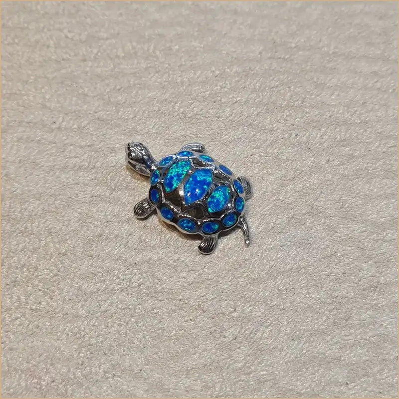 Pendentif tortue opaline bleue "POT45.B"