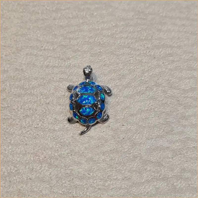 Pendentif tortue opaline bleue "POT45.B"