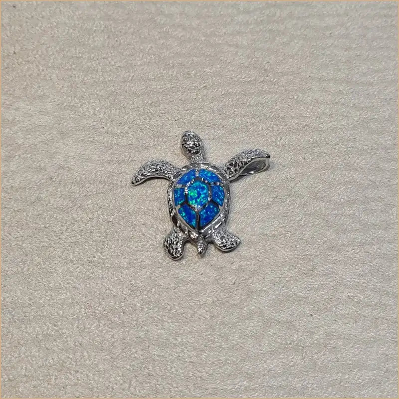Pendentif tortue opaline bleue "POT47.B"