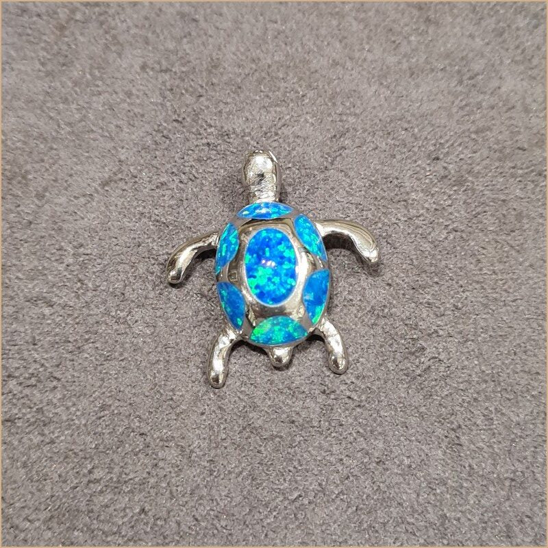 Pendentif tortue opaline bleu "POT51.B"