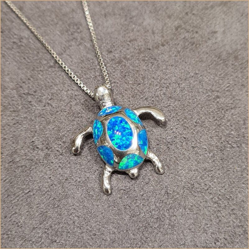 Pendentif tortue opaline bleu "POT51.B"