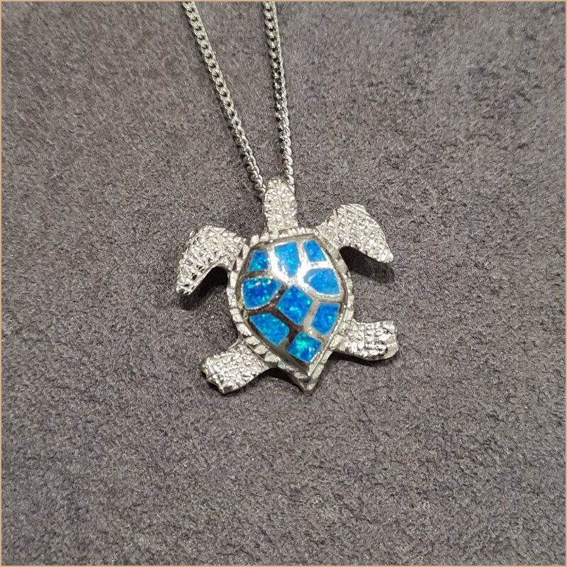Pendentif tortue opaline bleu "POT53.B"