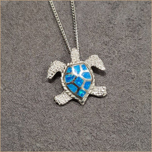 Pendentif tortue opaline bleu "POT53.B"