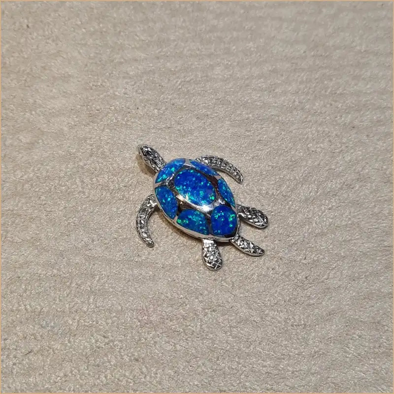 Pendentif tortue opaline bleue "POT14.B"