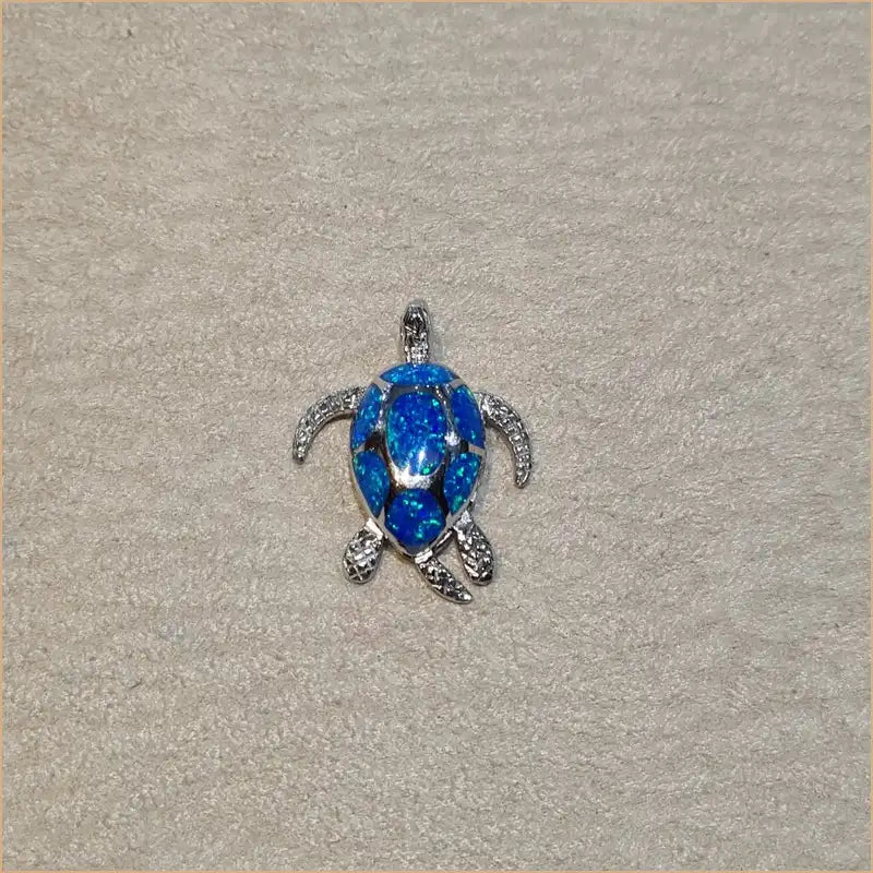 Pendentif tortue opaline bleue "POT14.B"