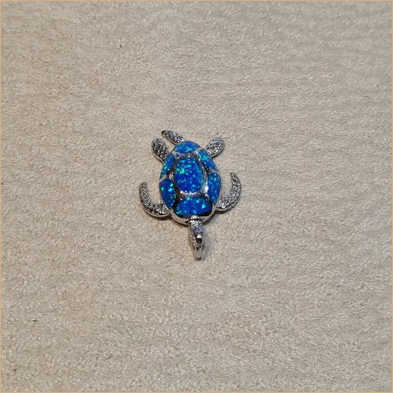Pendentif tortue opaline bleue "POT14.B"